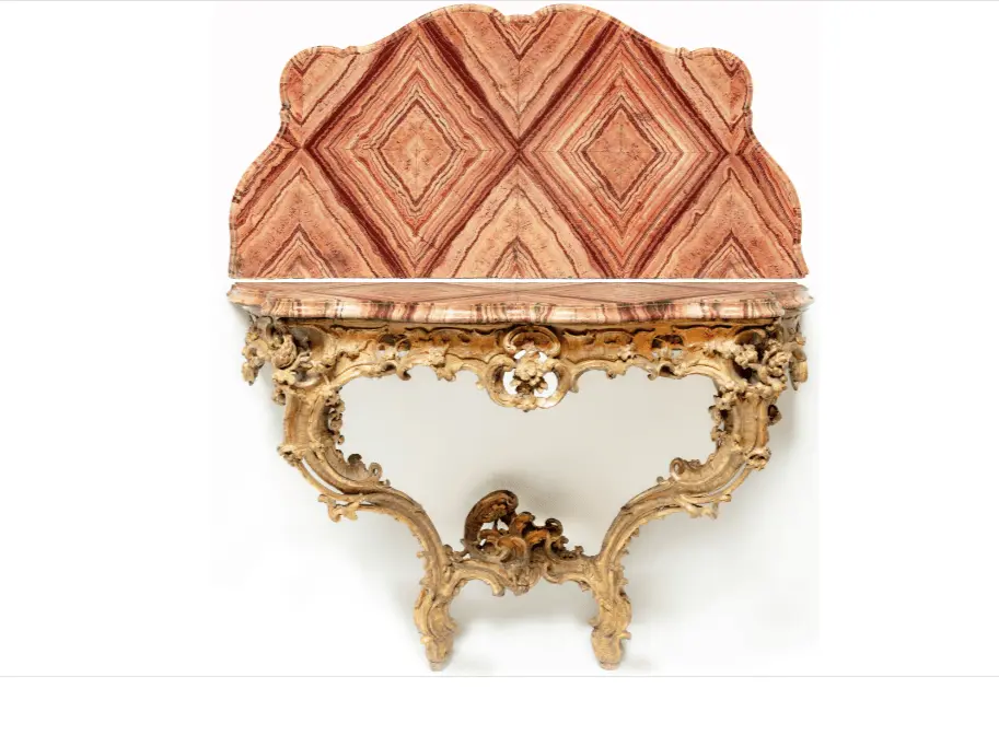 A Roman Rococo Carved Giltwood Console D’Applique, With A Serpentine Veneered Alabastro Listato Marble Top